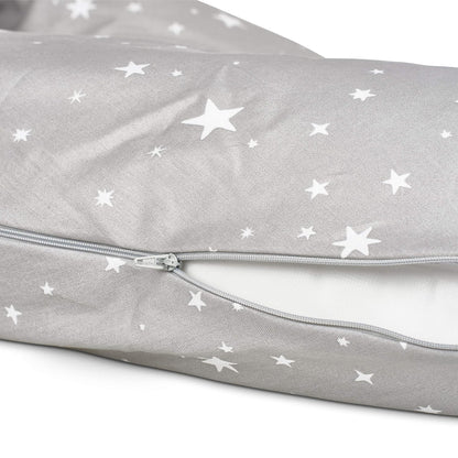 Close-up of Medela nursing pillow partially open to show soft inner filling.