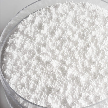 Close-up of Medela nursing pillow showing Quiet Micro-Pearl filling for soft support.