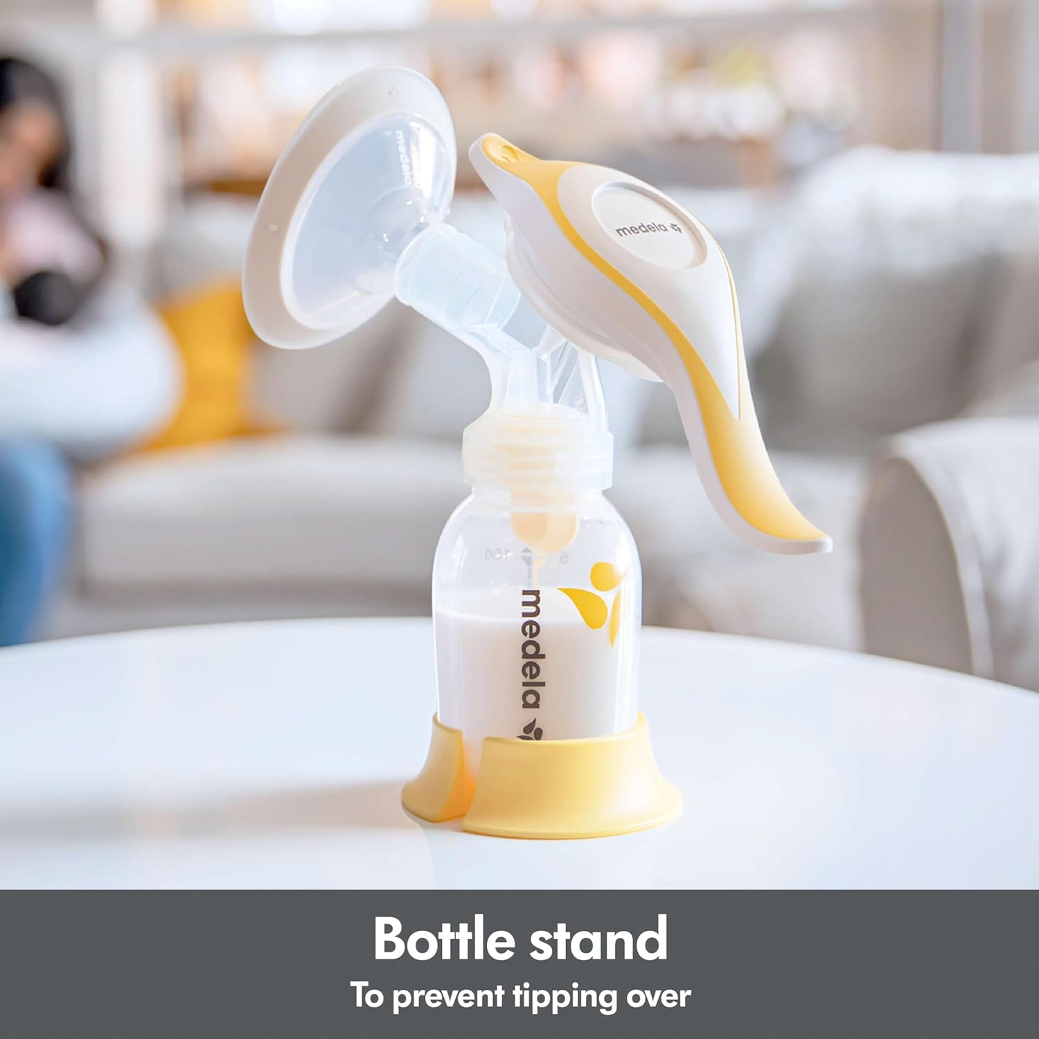 Medela Harmony Breast Pump with Bottle Stand to Prevent Tipping Over