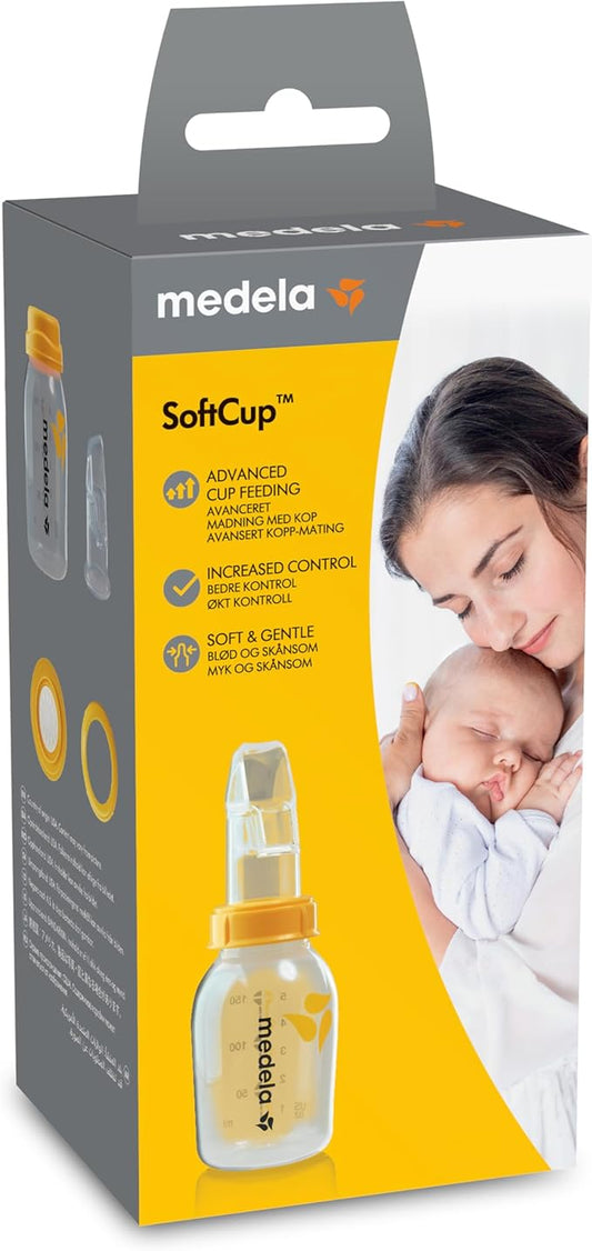 Medela SoftCup, a specialized feeding device made of soft silicone, with clear milk graduations and one-way valve, providing controlled and comfortable feeding for babies.
