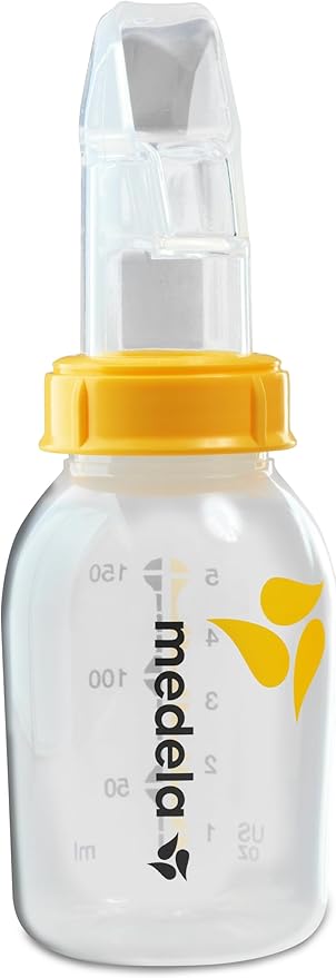 Medela SoftCup, a specialized feeding device made of soft silicone, with clear milk graduations and one-way valve, providing controlled and comfortable feeding for babies.