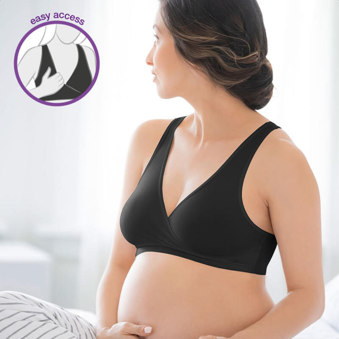 Mom wearing Medela Sleep Bra with easy access feature for breastfeeding