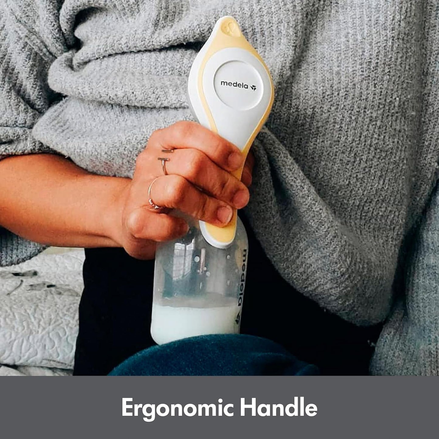 Mother Using Medela Harmony Breast Pump with Ergonomic Handle for Comfortable Use